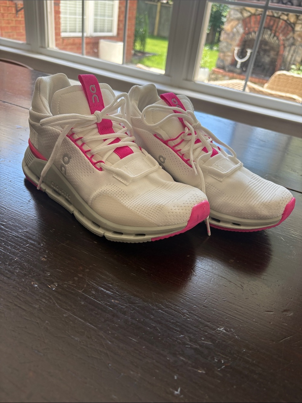 On Running White Athletic Sneakers with Pink Accents